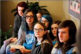  ?? NWA Democrat-Gazette/DAVID GOTTSCHALK ?? Gentry Public School students Amy Eckart (from the back), Naomi Brinkley, Paige Setzer, Emaly Wilkins, Emily Jessen, Autumn Broglen and Jaden Lothes listen Feb. 24 to Ryan Worley, manager of the Washington Regional Cancer Support Home in Fayettevil­le....