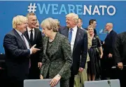  ?? [AP FILE PHOTO] ?? U.S. President Donald Trump jokes with British Foreign Minister Boris Johnson as British Prime Minister Theresa May walks past May 25 during a working dinner meeting at NATO headquarte­rs in Brussels.