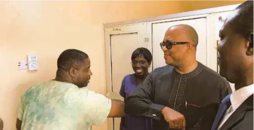  ??  ?? Ihekweazu and health workers at the Federal Medical Centre, Owo