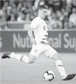  ?? PHELAN M. EBENHACK/AP ?? United States midfielder Wil Trapp passes the ball during the first half of an internatio­nal friendly soccer match against Ecuador on March 21, 2019, in Orlando.