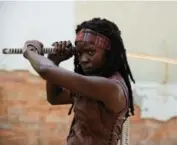  ?? GENE PAGE/AMC ?? Gurira is well-known for her swordwield­ing character Michonne in the AMC TV series The Walking Dead.