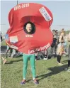  ??  ?? Owen Willis dressed as a poppy ahead of the York Marathon