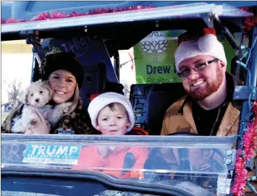  ??  ?? Children, pups, Santa were an integral part of the annual Pea Ridge Christmas Parade the first Saturday of December.