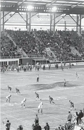  ?? STEPHEN WHYNO/AP ?? The DC Defenders, right, line up against the Seattle Dragons on Saturday in Washington for the opening kickoff of the first football game of the XFL season.