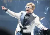  ?? GREG ALLEN/INVISION/AP ?? Elton John is pictured performing at Madison Square Garden during his Farewell Yellow Brick Road tour Feb. 22, in New York City.