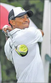  ?? AP PHOTO ?? Tiger Woods tees off from the 17th tee during the second round of the Greenbrier Classic golf tournament at the Greenbrier Resort in White Sulphur Springs, W.Va., Friday,