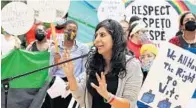  ?? STEPHEN M. DOWELL/ORLANDO SENTINEL ?? Florida Rep. Anna Eskamani speaks during an Orlando Internatio­nal Airport concession­aire workers protest at City Hall on July 7.