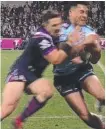  ??  ?? Bill Slater tackles Sosaia Feki.