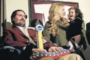  ?? [AP FILE PHOTO] ?? Former Boston College baseball captain Pete Frates, left, appears with his wife, Julie and 2-year-old daughter Lucy last year at their home in Beverly, Mass. Pete Frates, who inspired people the ice bucket challenge is back in the hospital.