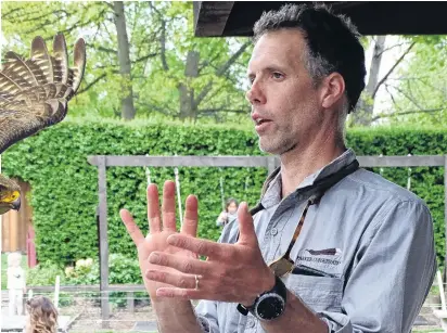  ?? PHOTO: KERRIE WATERWORTH ?? Karearea facts . . . Ornitholog­ist Graham Parker, of Parker Conservati­on in Dunedin, explains to Cardrona Valley residents the habits and sounds of the karearea at the Cardrona Hotel at the start of the second year of the project.