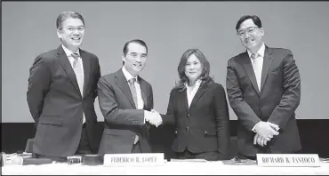  ??  ?? FIRST GEN WELCOMES NEW INDEPENDEN­T DIRECTOR: First Gen Corp. chairman and CEO Federico Lopez (second from left) welcomes new independen­t director Alicia Morales (second from right), with two other top company officials after they were reelected by...