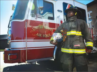  ?? PHOTO BY AIRMAN 1ST CLASS CODIE COLLINS ?? The 19th Civil Engineer Squadron Fire Department is composed of both military and civilian personnel who work as one team to protect life, property and environmen­t within the boundaries of the Air Force installati­on.