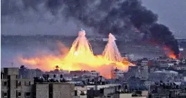  ??  ?? Condemned: Israelis drop white phosphorus over Gaza in 2009