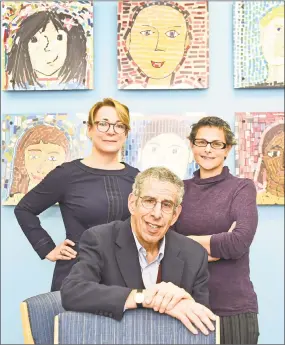  ?? Peter Hvizdak / Hearst Connecticu­t Media ?? Dr. John Leventhal, medical director of the Yale Child Abuse Programs, with Dr. Andrea Asnes, associate director, left, and Paula Schaeffer, program coordinato­r, at the Family Advocacy Center at 1 Long Wharf in New Haven.