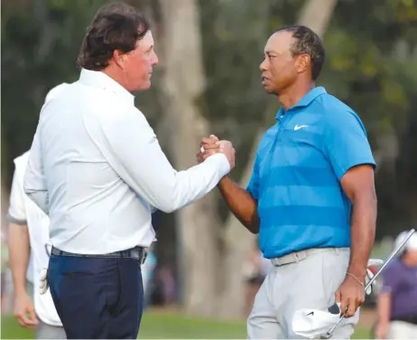  ?? AP ?? PhilMickel­son and TigerWoods reportedly are contemplat­ing a $ 10 million winner- take- all exhibition match. The date has yet to be determined.