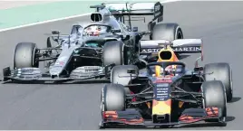  ??  ?? MOMENT OF TRUTH. Lewis Hamilton lines up Max Verstappen in Hungary, after Mercedes beat Red Bull in a high speed chess game regarding tyre usage.