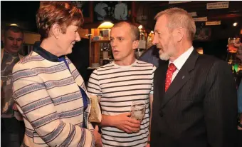  ??  ?? Seán Kelly and his wife Juliette chatting with Genie Farrell at the 1997 Kerry team reunion in Páidí Ó Sé’s pub on Saturday night. Photo by Declan Malone