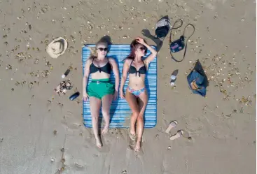  ??  ?? Chris uses his drone to give ‘new angles’ to ‘old concepts’ – this shot was taken at Bournemout­h Beach