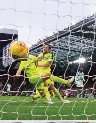  ??  ?? Celtic’s Odsonne Edouard didnlt hesitate to make it 3-1 after he