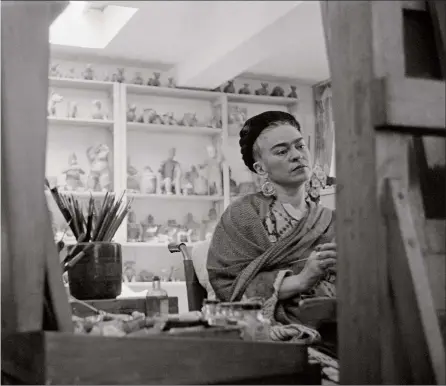 ??  ?? Frida Khalo working in her studio a few months before her death in 1954