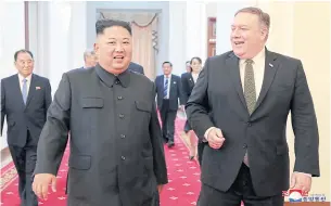  ??  ?? North Korea’s leader Kim Jong-un, left, and US Secretary of State Mike Pompeo, right, are seen at the Paekhwawon State Guesthouse in Pyongyang on Sunday.