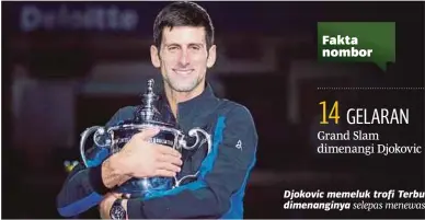  ?? [ FOTO AGENSI ] ?? Djokovic memeluk trofi Terbuka Amerika Syarikat yang dimenangin­ya selepas menewaskan Juan Martin del Potro, semalam.