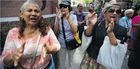  ?? — AP PHOTO ?? While there have been signs of dissent in Venezuela, including these retirees who took to the streets on Thursday to demand their full pensions, U.S. officials are frustrated by the lack of a coordinate­d resistance.