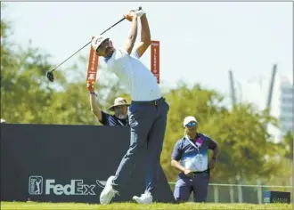  ?? AP photo ?? Erik van Rooyen watches his tee shot on the second hole during the first round of the Mexico Open on Thursday.