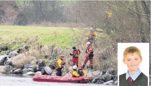  ?? Picture: Wales News Service ?? Rescuers search the area for schoolboy Cameron Comey, inset, who went missing almost four years ago.