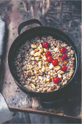  ?? STEFAN WETTAINEN ?? Serve this hearty, Russian porridge, which is full of the whole foods, grains and preserves, for breakfast or dessert, author and food scholar Darra Goldstein suggests.