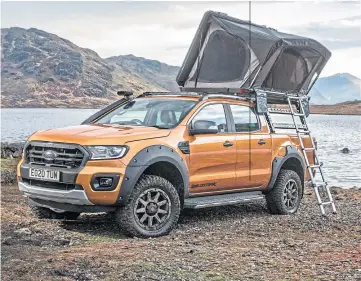  ??  ?? The Ford Ranger is available with a range of outdoor lifestyle-inspired options, including a fantastic roof-mounted tent for go-anywhere camping expedition­s.