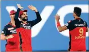  ?? PTI ?? Royal Challenger­s Bangalore players celebrate during Indian Premier League 2021 match