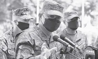  ?? PHOTO BY AP/AARON FAVILA ?? Chief of Staff General Andres Centino speaks to reporters during opening ceremonies of the “Balikatan” (“shoulder to shoulder”) joint military exercises at Camp Aguinaldo, Quezon City, on March 28, 2022. Centino was reappointe­d last January 7 by President Ferdinand R. Marcos Jr. after cutting short the term of the military chief of staff he appointed five months ago without explaining the surprise move.