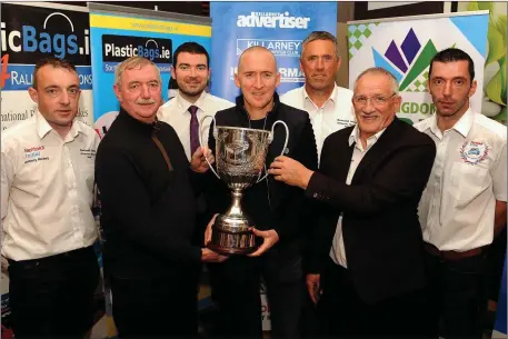  ?? Photo by Eamonn Keogh ?? Johnny Hickey (PRO), Fintan Foley, Minister of State for Tourism and Sport Brendan Griffin TD, Paul Nagle, Diarmuid Cronin (Chairman), Rentokil Initial managing director Michael O’Mahoney and Darren McCormick (Clerk of the course) with the Maurice Nagle memorial cup at the launch of the Rentokil Initial Killarney Historic Rally at The Gleneagle Hotel Killarney, on Sunday. Killarney and District Motor Club will host Ireland’s only event to cater solely for historic rally cars on Saturday November 30.