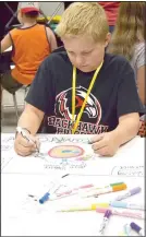  ?? ?? A student works on a project during Space Camp.