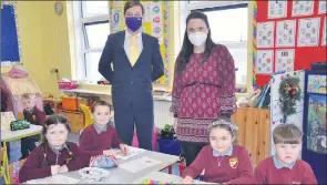  ?? (Pic: John Ahern) ?? BEGINNING ANEW IN BALLYNOE: Principal, Hugh Cronin and teacher, Sharon Beirne, with Ballynoe National School infants, l-r: Sophie, Alex, Abigail and Seamus, set to pick up where they left off prior to Christmas.