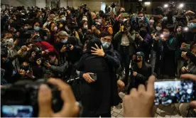  ?? Photograph: Miguel Candela/SOPA Images/REX/Shuttersto­ck ?? Supporters comfort each other after hearing bail results at West Kowloon Court in Hong Kong