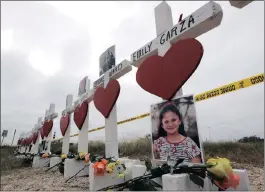  ?? PICTURE: ASSOCIATED PRESS ?? Crosses showing shooting victims’ names near the First Baptist Church in Sutherland Springs, Texas. A man opened fire inside the church in the small South Texas community, killing more than two dozen and injuring others.