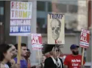  ?? THE ASSOCIATED PRESS ?? People demonstrat­e against the GOP health care bill, Thursday, June 29, 2017, in Philadelph­ia.
