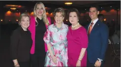  ?? (NWA Democrat-Gazette/Carin Schoppmeye­r) ?? Arkansas Women’s Hall of Fame Board Members Suzanne Clark (from left), Kim Sharpe, Renie Rule and Susan Hutchinson with Derrell Hartwick of the North Little Rock Chamber of Commerce attend the Saving Grace’s Butterflie­s & Blooms on March 28 at the Rogers Convention Center. The board members presented a $5,000 donation to Saving Grace at the benefit luncheon.