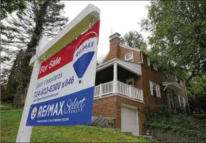  ?? GENE J. PUSKAR / ASSOCIATED PRESS 2021 ?? Existing home sales fell 2.4% last month from March to a seasonally adjusted annual rate of 5.61 million, the National Associatio­n of Realtors said Thursday. That was slightly higher than what economists were expecting, according to Factset.