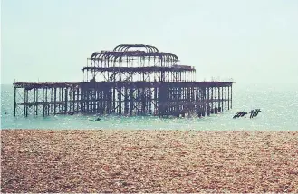  ??  ?? ▲ Brighton’s West Pier has seen better times. What times!