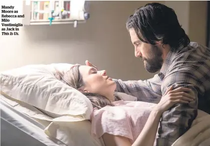  ??  ?? Mandy Moore as Rebecca and Milo Ventimigli­a as Jack in This Is Us.