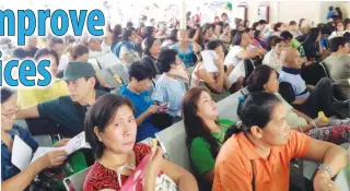  ??  ?? Patients wait for their turn at the PCSO Lung Center of the Philippine­s satellite office in Quezon City.