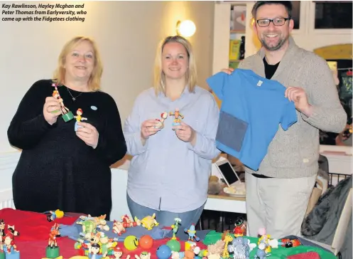  ??  ?? Kay Rawlinson, Hayley Mcghan and Peter Thomas from Earlyversi­ty, who came up with the Fidgetees clothing
