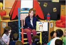  ?? PHOTOGRAPH­Y COASTAL CLICK ?? As part of her birthday celebratio­n, Ilene Silber reads to students at Northmore Elementary.