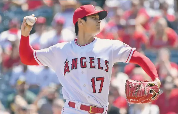  ?? GETTY IMAGES ?? Shohei Ohtani, el ‘Babe Ruth de Japón’, brilló intensamen­te en su primera apertura en Anaheim con los Angeles.