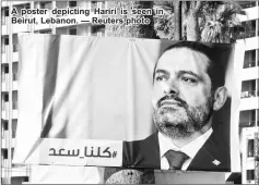  ??  ?? A poster depicting Hariri is seen in Beirut, Lebanon. — Reuters photo