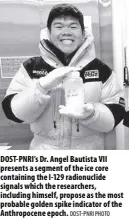  ?? DOST-PNRI PHOTO ?? DOST-PNRI’S Dr. Angel Bautista VII presents a segment of the ice core containing the I-129 radionucli­de signals which the researcher­s, including himself, propose as the most probable golden spike indicator of the Anthropoce­ne epoch.