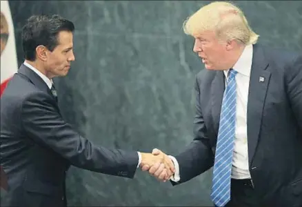  ?? YURI CORTEZ / AFP ?? Enrique Peña Nieto y Donald Trump, el pasado 31 de agosto en Ciudad de México